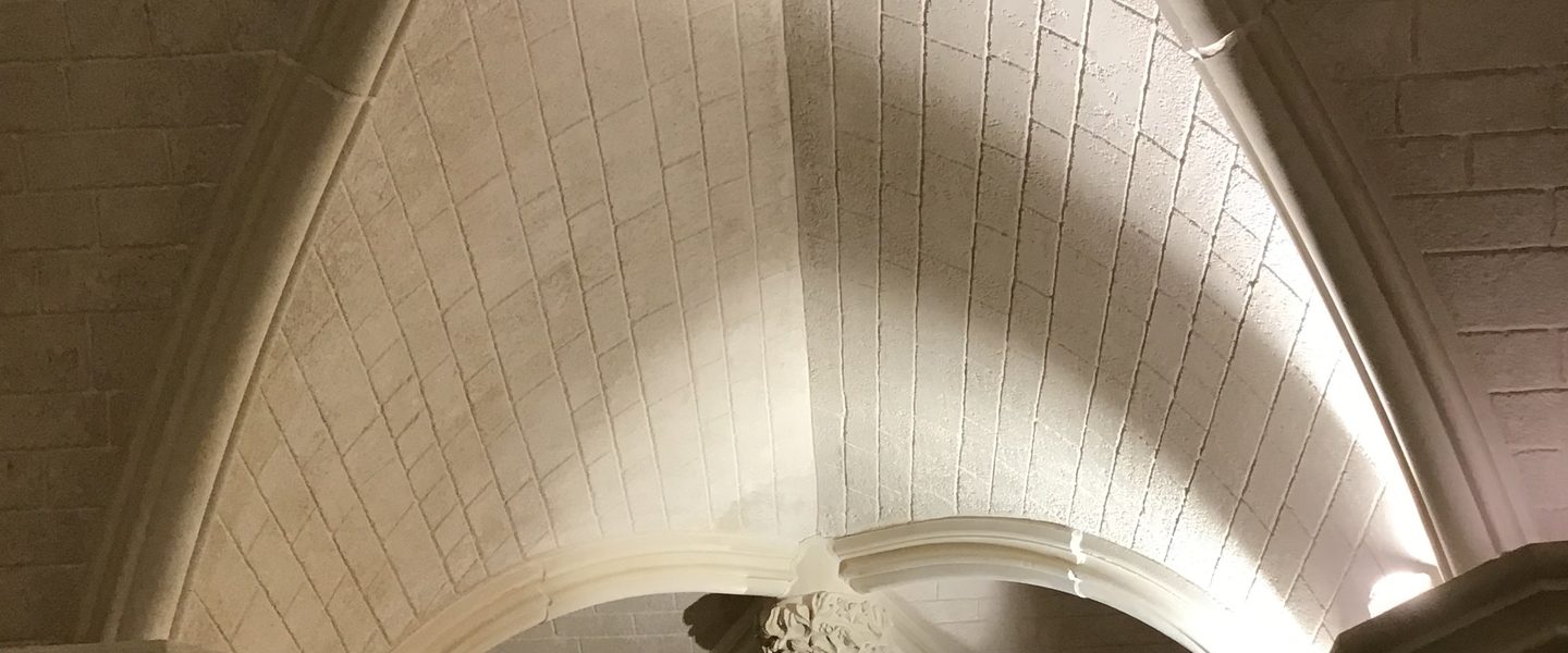 A carved cream vault.